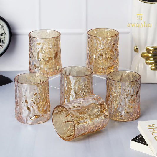 Set of 6 versatile glass tumblers - perfect for refreshing juices, whiskey and water.