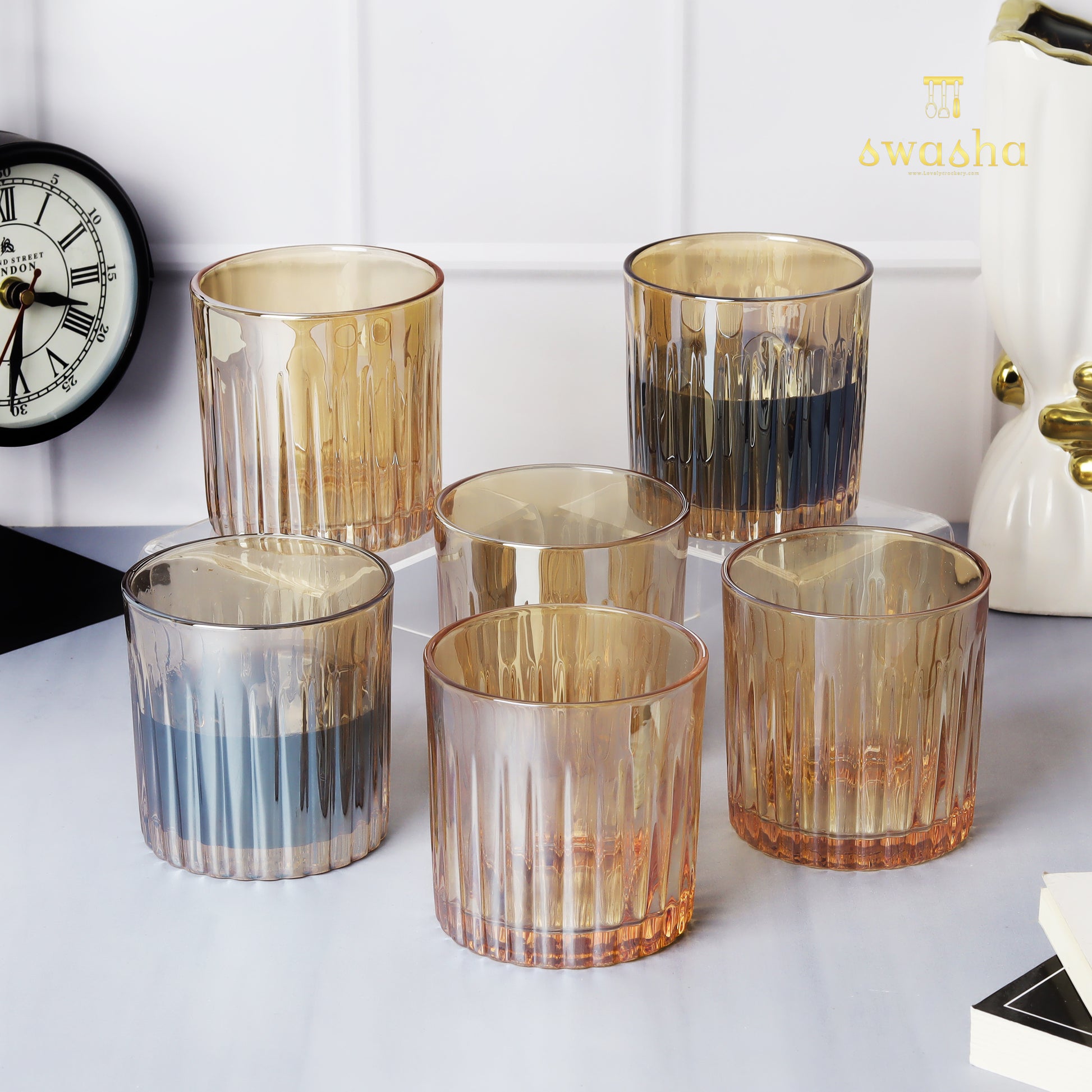 Set of 6 versatile glass tumblers - perfect for refreshing juices, whiskey and water.