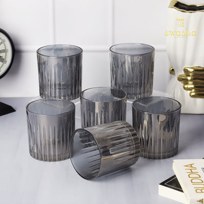 Set of 6 versatile glass tumblers - perfect for refreshing juices, whiskey and water.