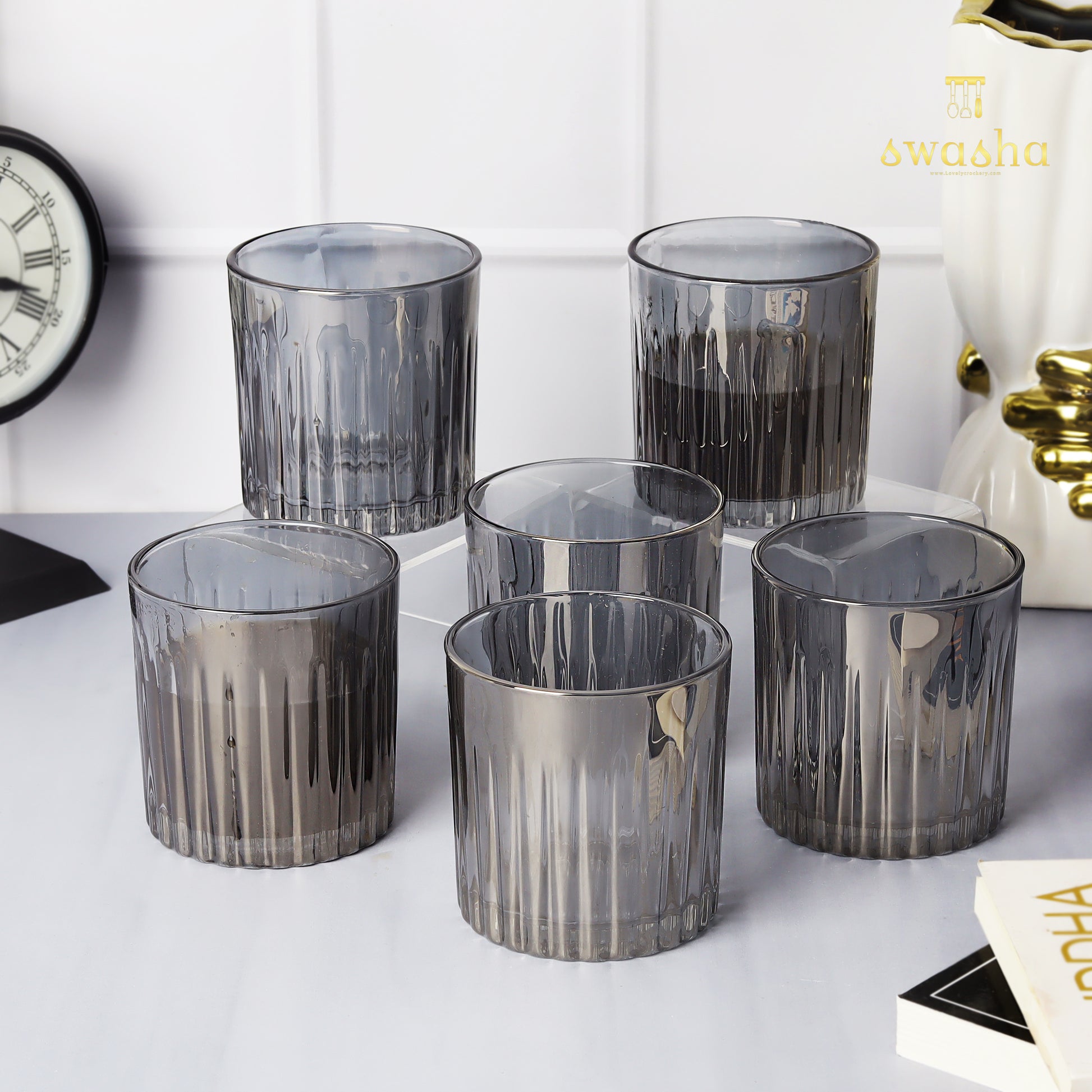 Set of 6 versatile glass tumblers - perfect for refreshing juices, whiskey and water.