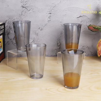 Set of 4 versatile glass tumblers - perfect for refreshing juices and water.