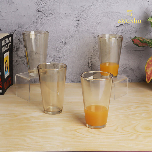 Set of 4 versatile glass tumblers - perfect for refreshing juices and water.